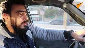 بطل سوري تحدي إعاقة شلل ساقيه ليصبح سائق سيارة